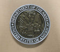 Close-up of a Department of the Army emblem on an Aluminum Military Grave Marker with detailed raised design and metallic finish