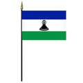 Lesotho national flag on pole