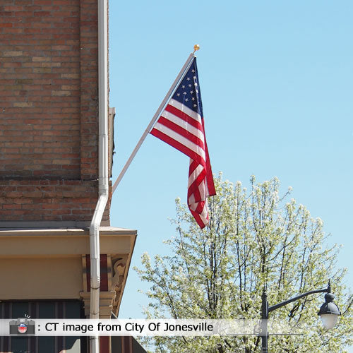 American flag on brick building