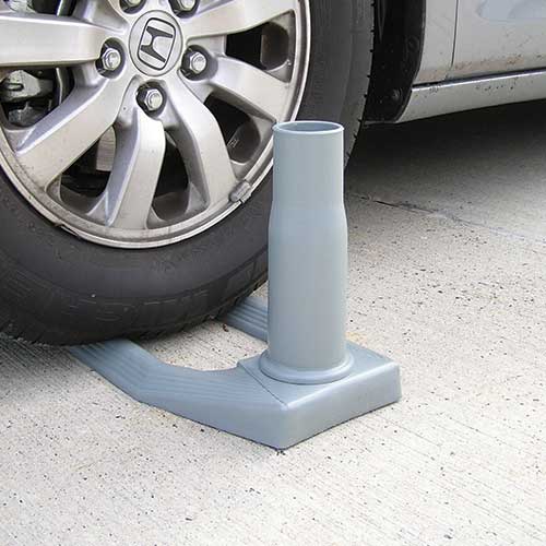 gray car tire chock on ground