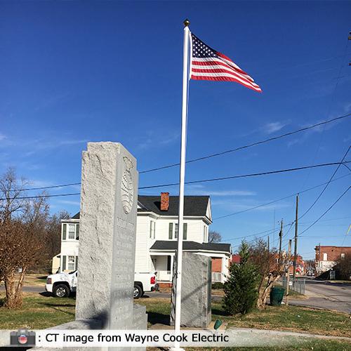 flag pole next to monument