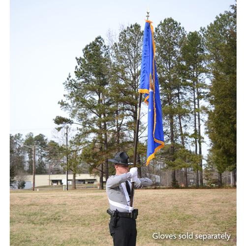 flag bearer in uniform outdoors