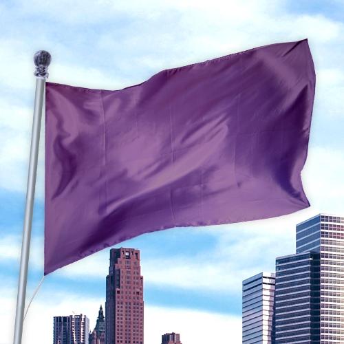 Solid Colored Flags - Premier Nylon flag in a solid lavender color waving against a city skyline and blue sky.