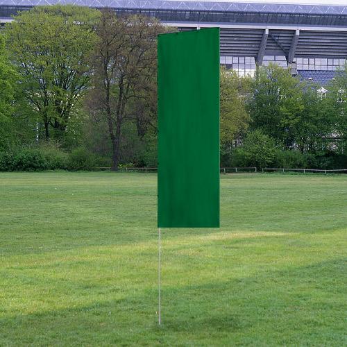 Solid Tall Advertising Flags with a green fabric panel displayed outdoors on a grassy field near trees and a stadium structure.