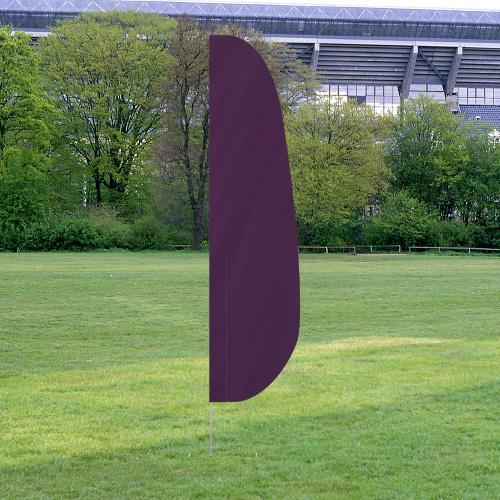 Solid Color Feather Flags standing on a grassy field with trees and a stadium structure in the background, featuring a deep purple color.