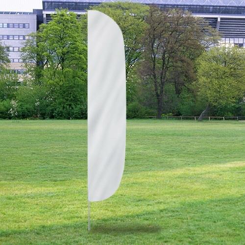 White Solid Color Flutter Flags displayed outdoors on green grass with trees and buildings in the background.
