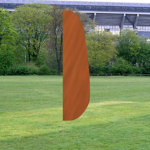 Solid Color Feather Flags in a vibrant orange shade displayed outdoors on green grass with trees and a stadium in the background.