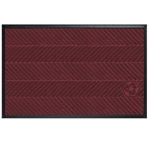 Waterhog Eco Elite Mats in deep red with textured diagonal stripe pattern and black border, featuring a subtle eco-friendly recycling symbol.
