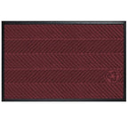 Waterhog Eco Elite Mats in deep red with textured diagonal stripe pattern and black border, featuring a subtle eco-friendly recycling symbol.