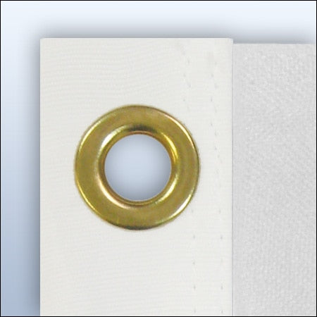 brass grommet on white fabric