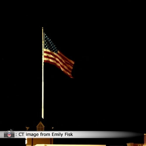flag waving in the night sky