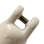 white plastic tool with metal prong