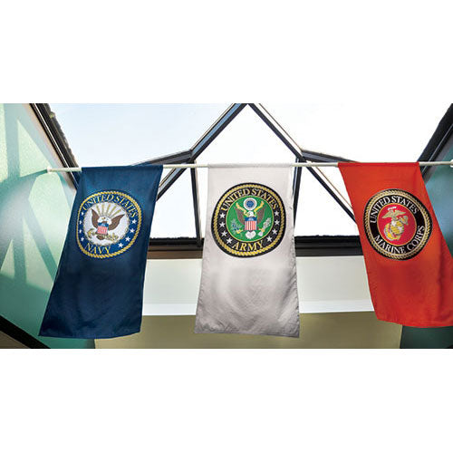 US military flags displayed indoors