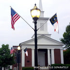 church with flags and lamp post