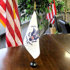 us flag on table with plant