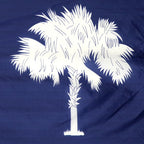 Close-up of white palmetto tree on blue South Carolina state flag