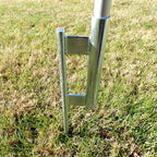 metal ground anchor on grass