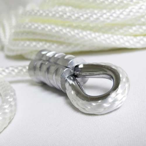 metal ring on white rope